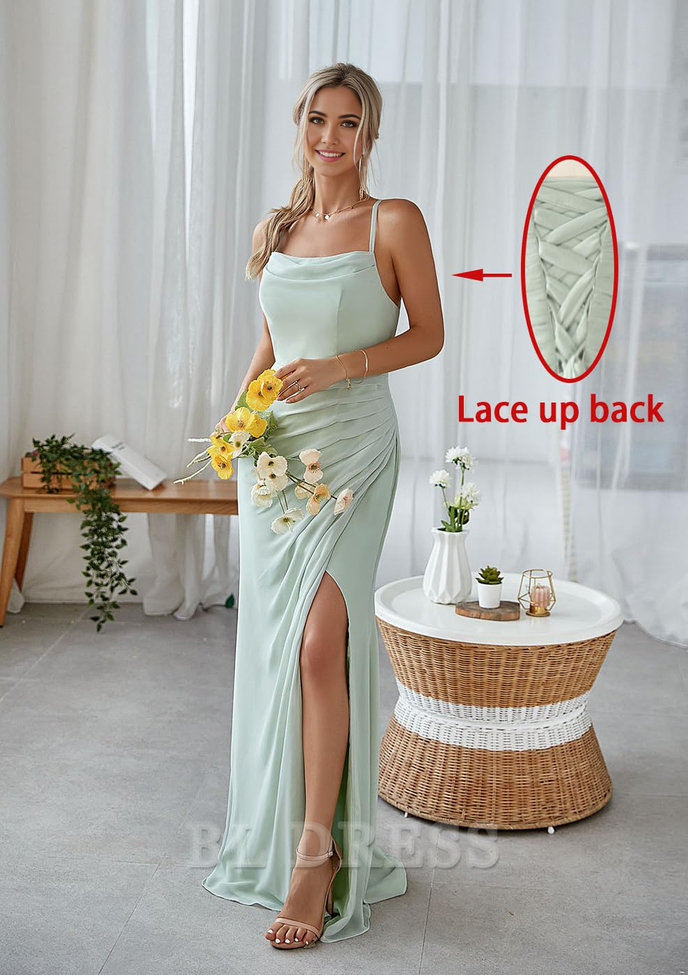 Woman posing in a sophisticated A-line prom dress featuring a V-neck and delicate spaghetti straps.