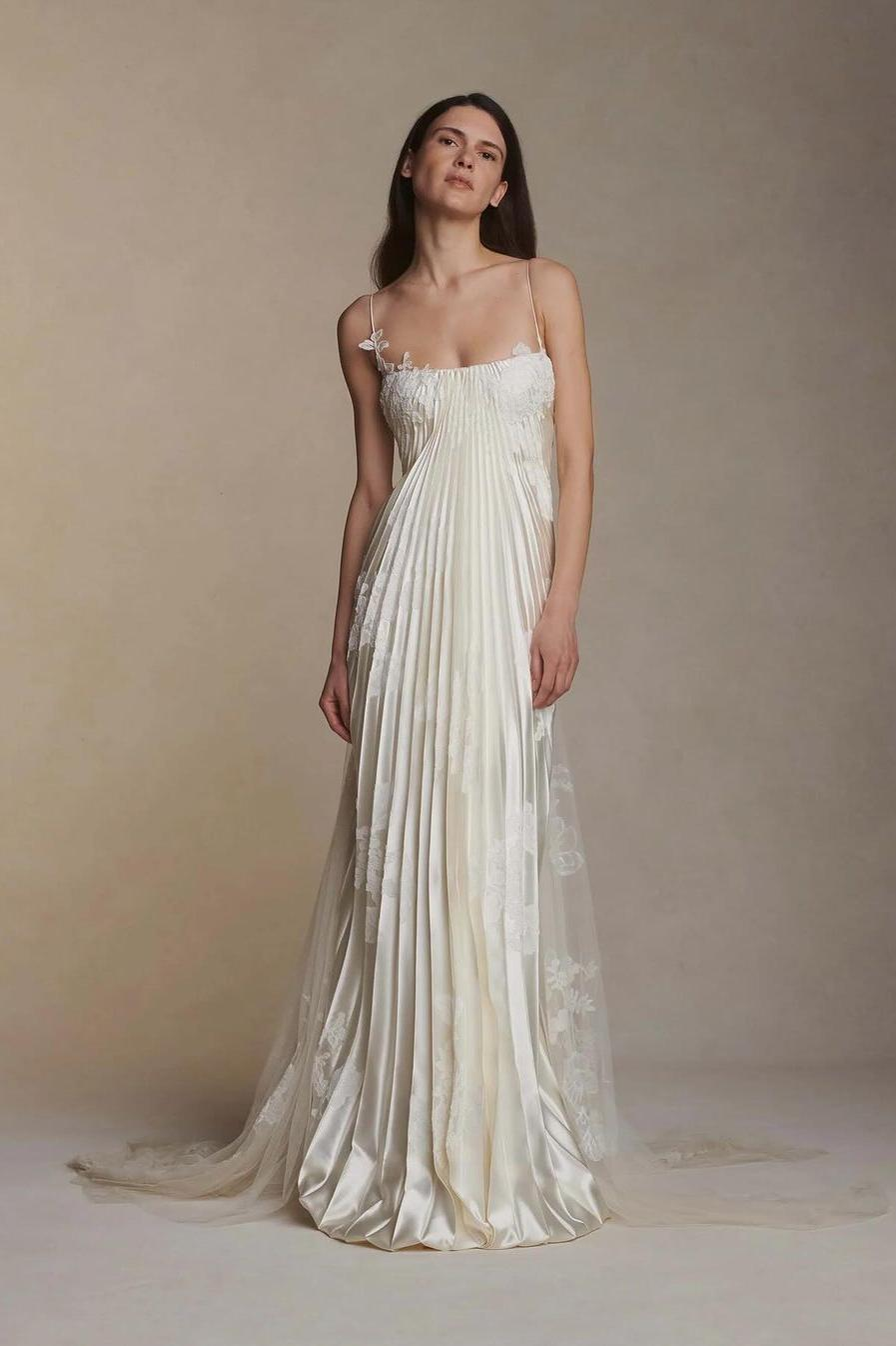 Elegant A-line V-neck prom dress with spaghetti straps and ruched detailing.