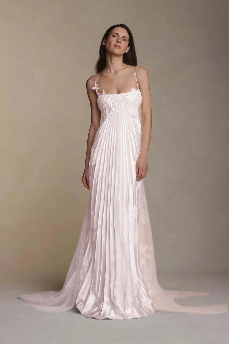 Elegant A-line V-neck prom dress with spaghetti straps and ruched detailing.