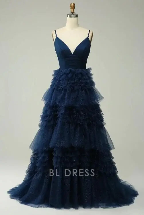 Navy A-line formal dress with spaghetti straps and ruffles.