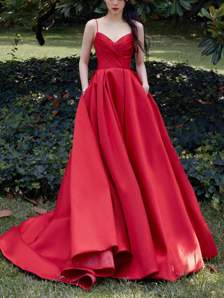 Elegant A-line satin prom dress with V-neck and spaghetti straps.