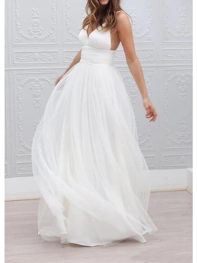 Elegant A-Line spaghetti strap wedding dress with V-neckline.