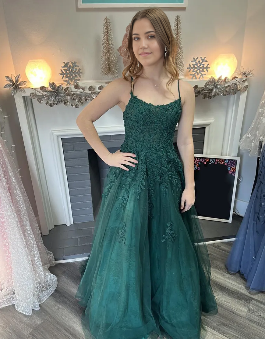 Dark green A-line prom dress with spaghetti straps and appliques.