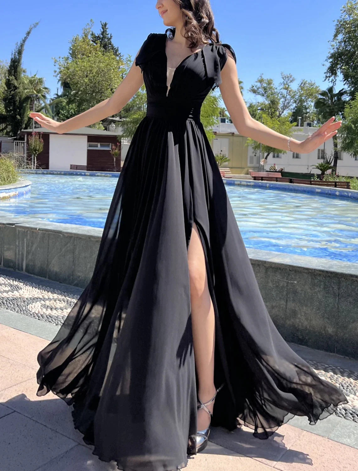 Back view of the strappy sleeveless A-line prom dress.