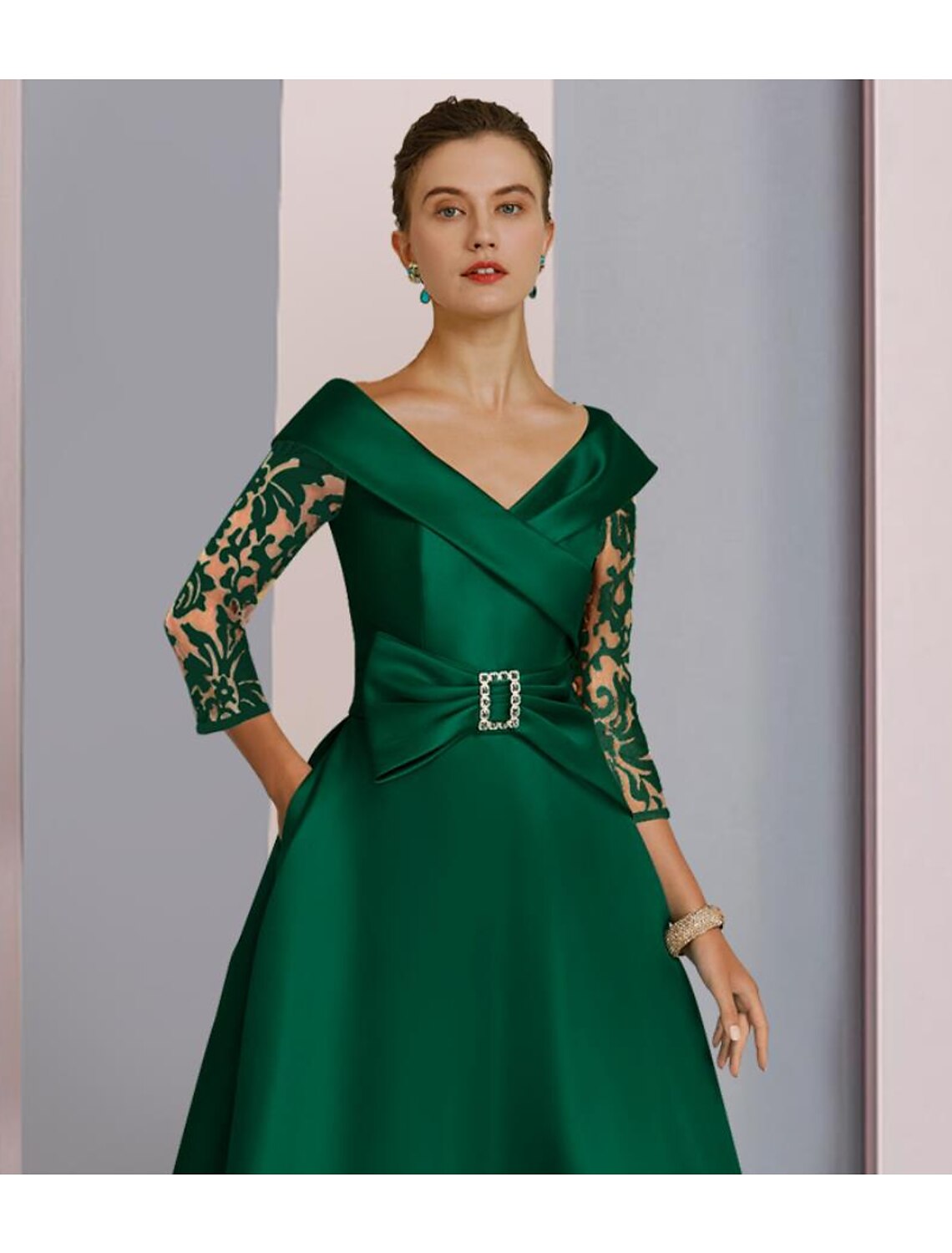 Back view of the elegant A-Line V-neck tea length dress, showcasing the satin fabric and bow detail.