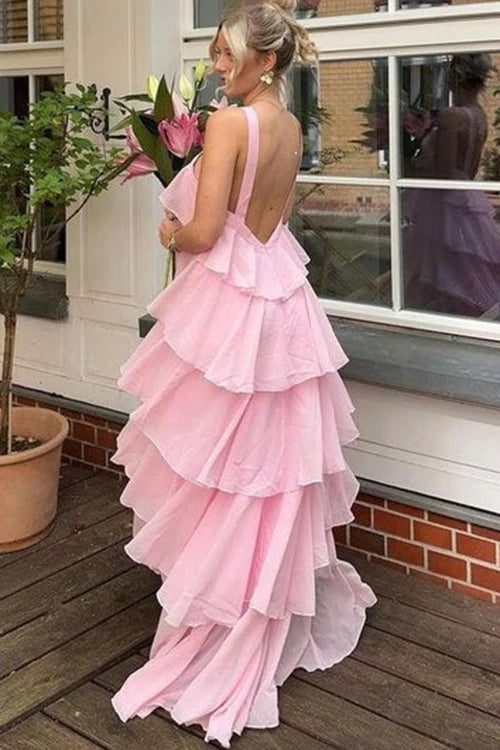 Back view of the long pink A-line tiered prom dress.