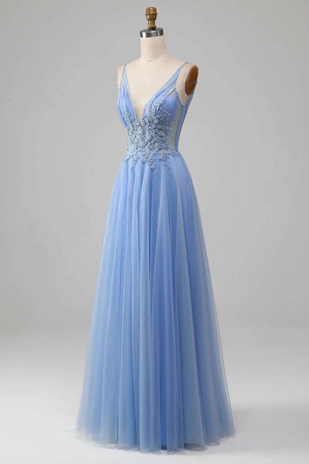 Full length view of the blue A-line evening gown, featuring a flowing tulle skirt.