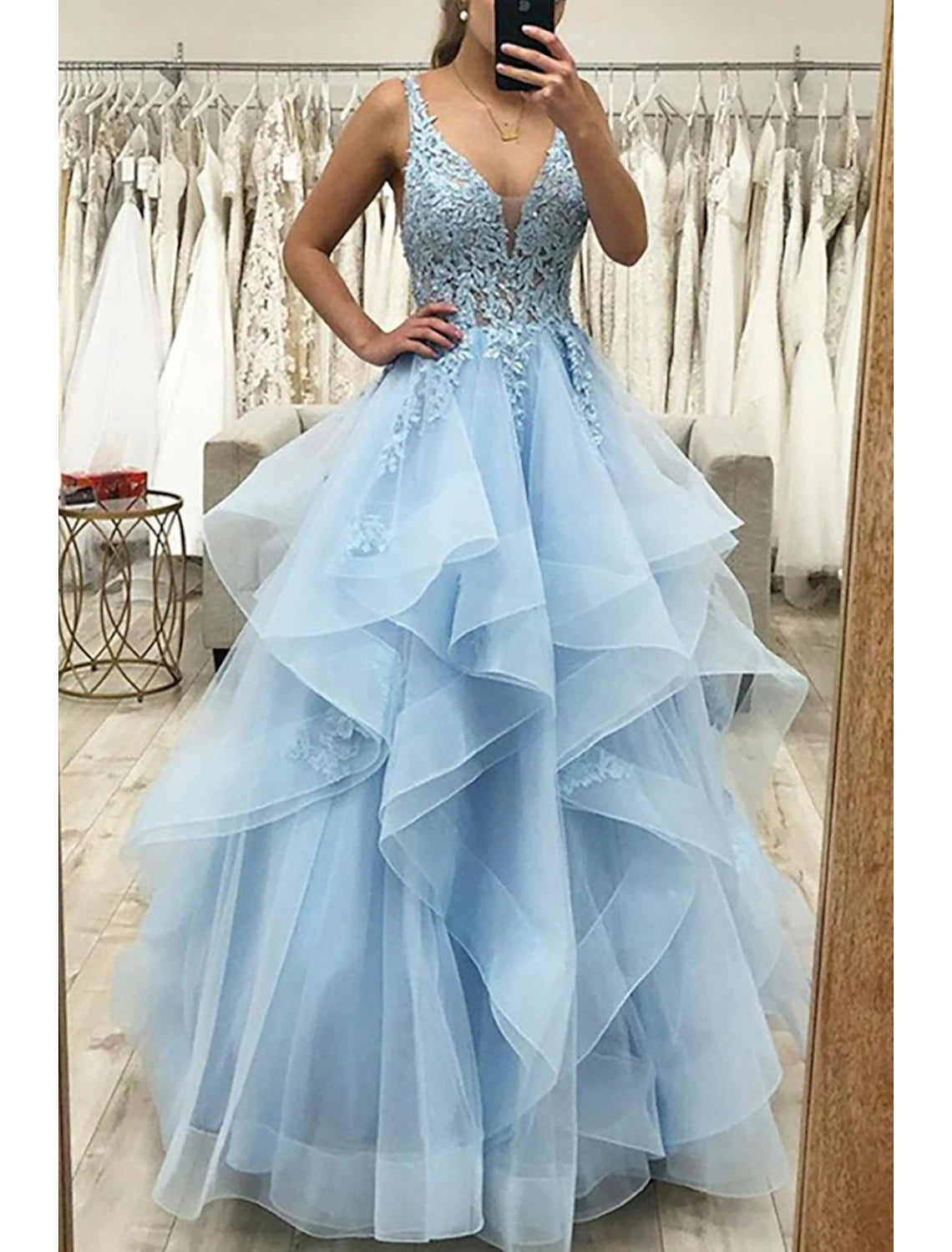 Back view of the elegant A-Line V-Neck Tulle Ball Gown with backless detail.