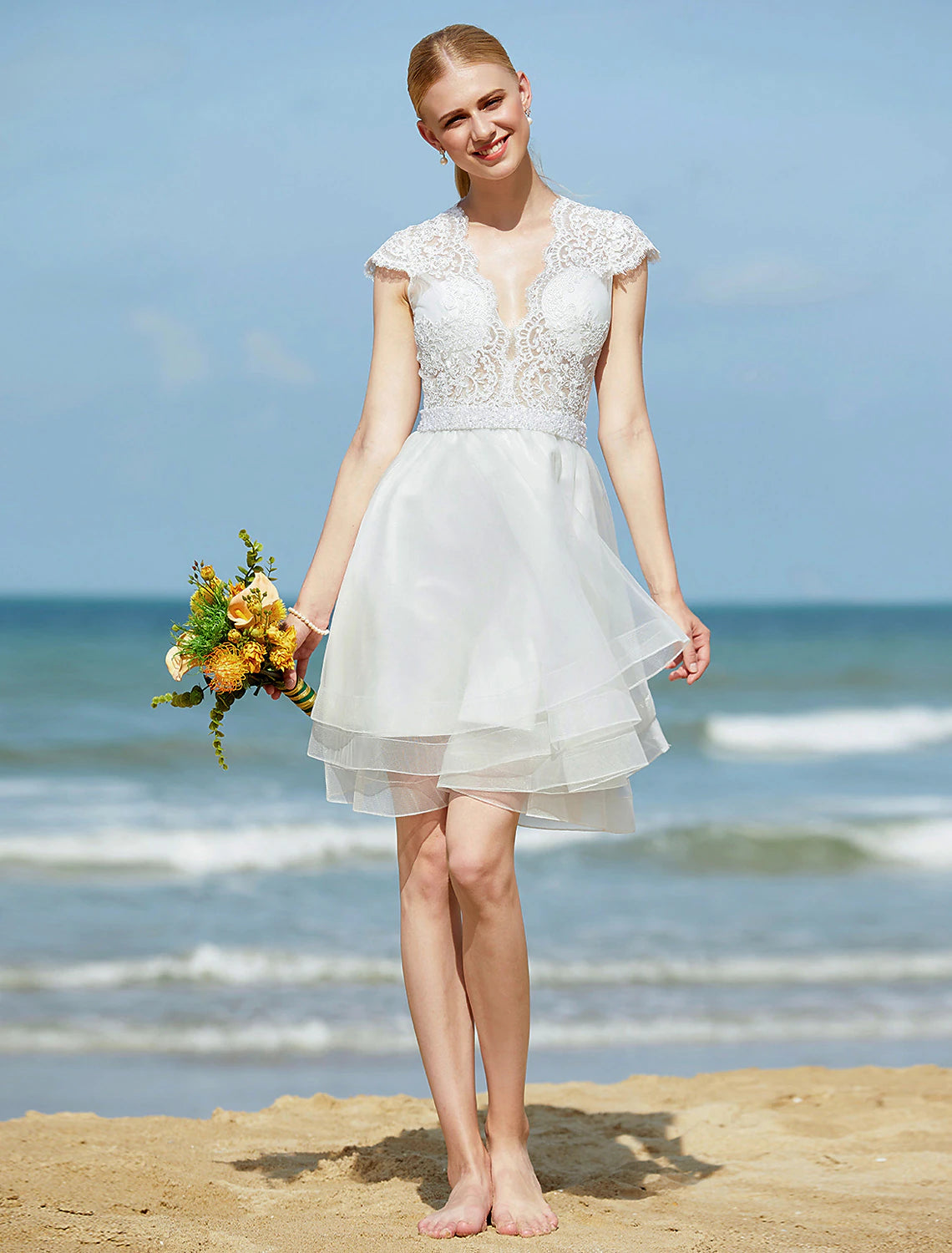 Full view of the A-Line V-Neck tulle wedding dress.
