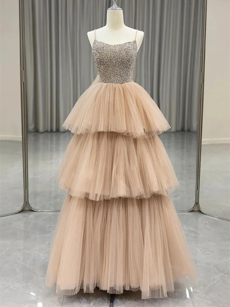 Close-up of the A-line tulle beaded spaghetti strap prom dress with delicate beading.