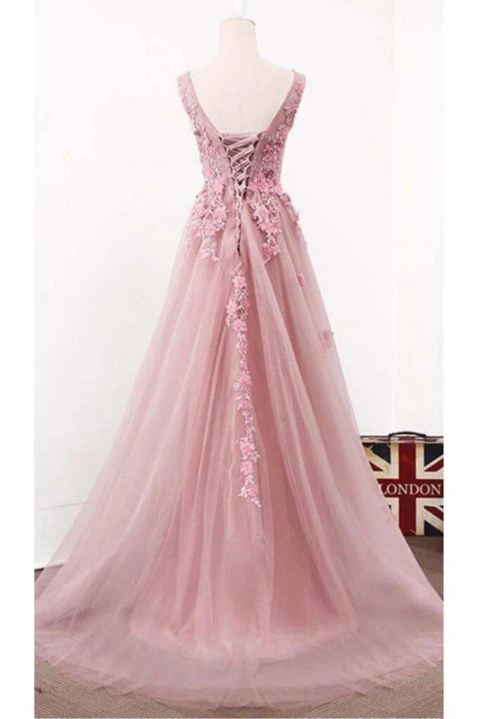 Back view of a long tulle floral party dress with intricate details.