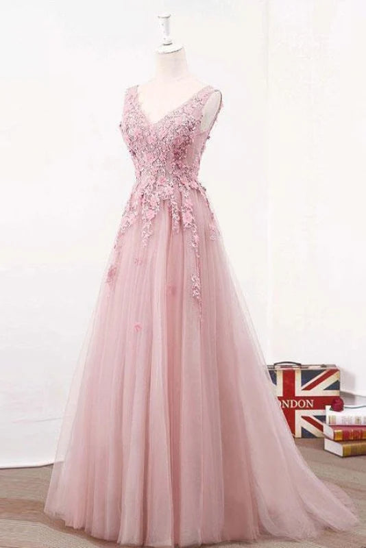 Back view of the flowing A-line prom dress with appliques.