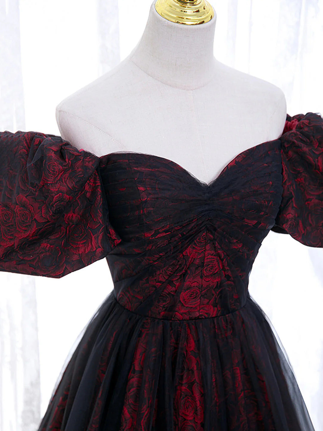 Back view of an A-Line tulle lace long prom dress.