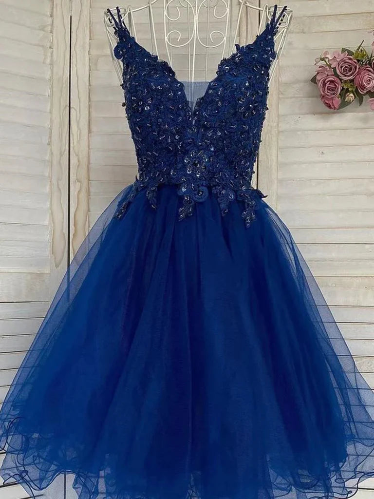 Short A-line V-neck dress with lace bodice and layered tulle skirt.