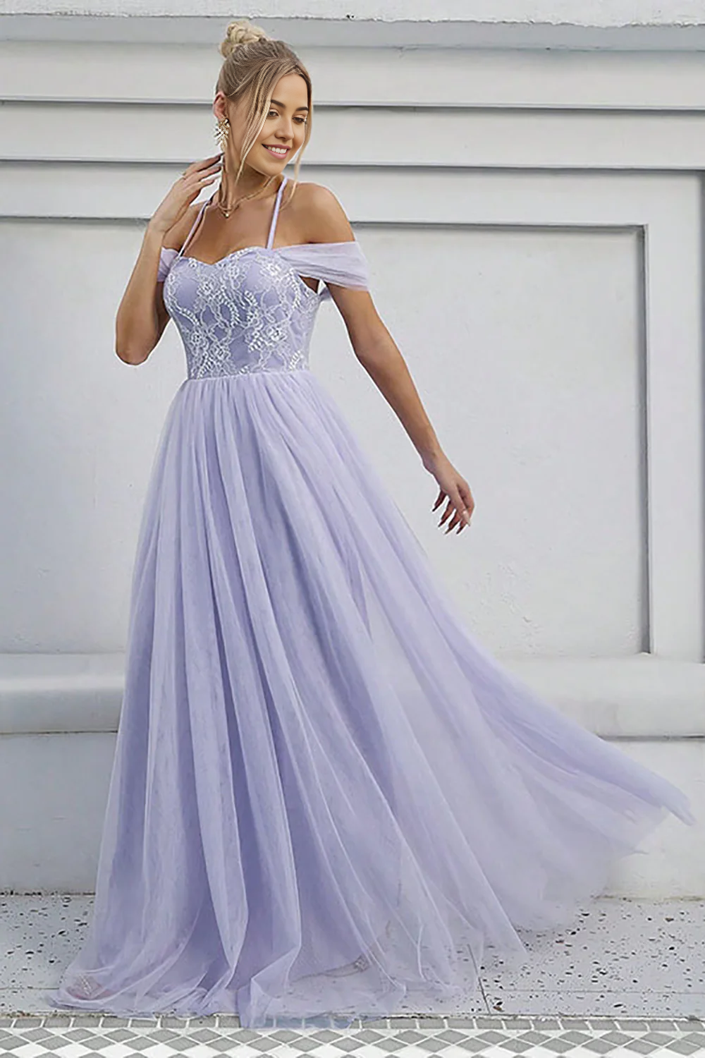 Back view of the V-neck formal dress with a graceful tulle skirt.