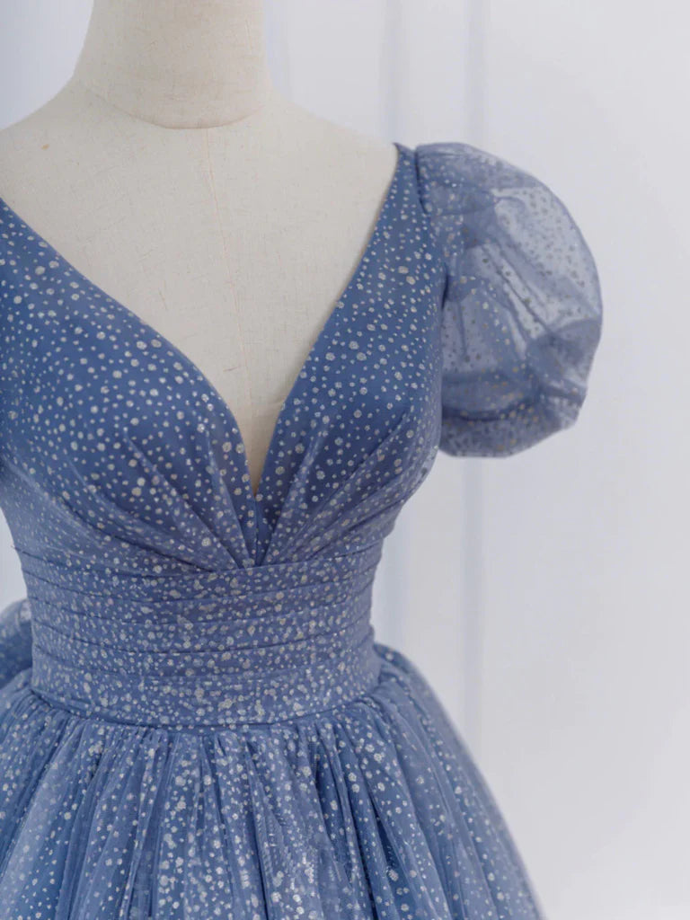 Side view of the flowing A-line prom gown.