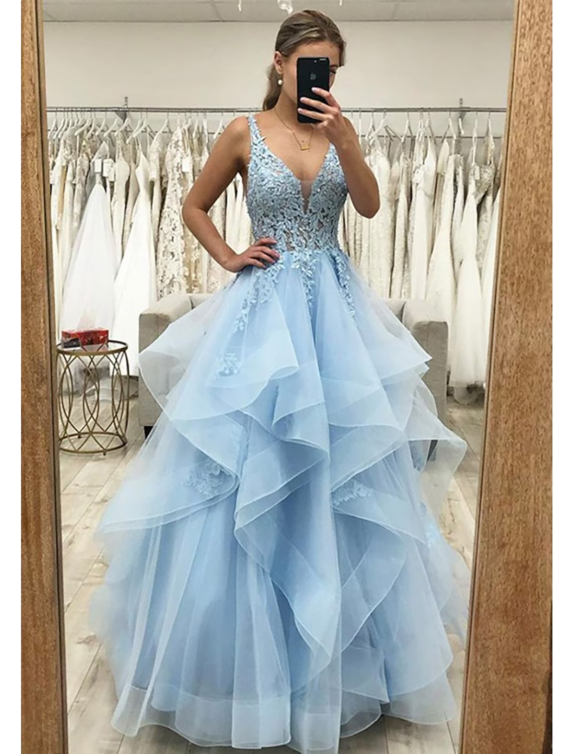 Elegant light blue A-line V-neck tulle prom dress with appliques and a floor-length skirt.