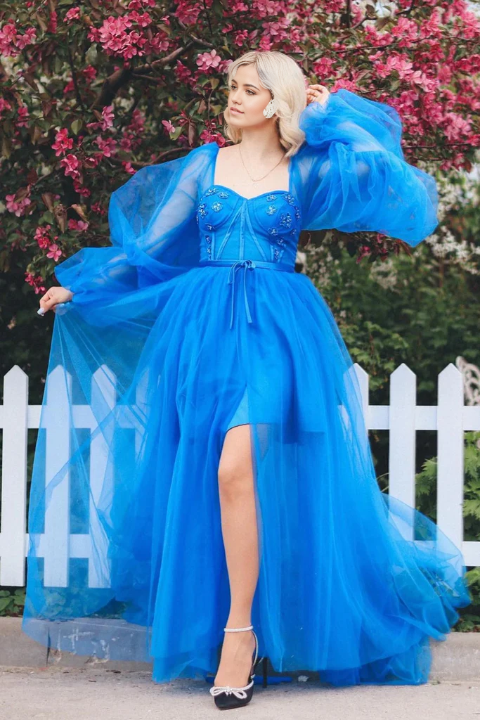 Elegant A-Line V-Neck Tulle Prom Dress with lace applique and illusion sleeves.