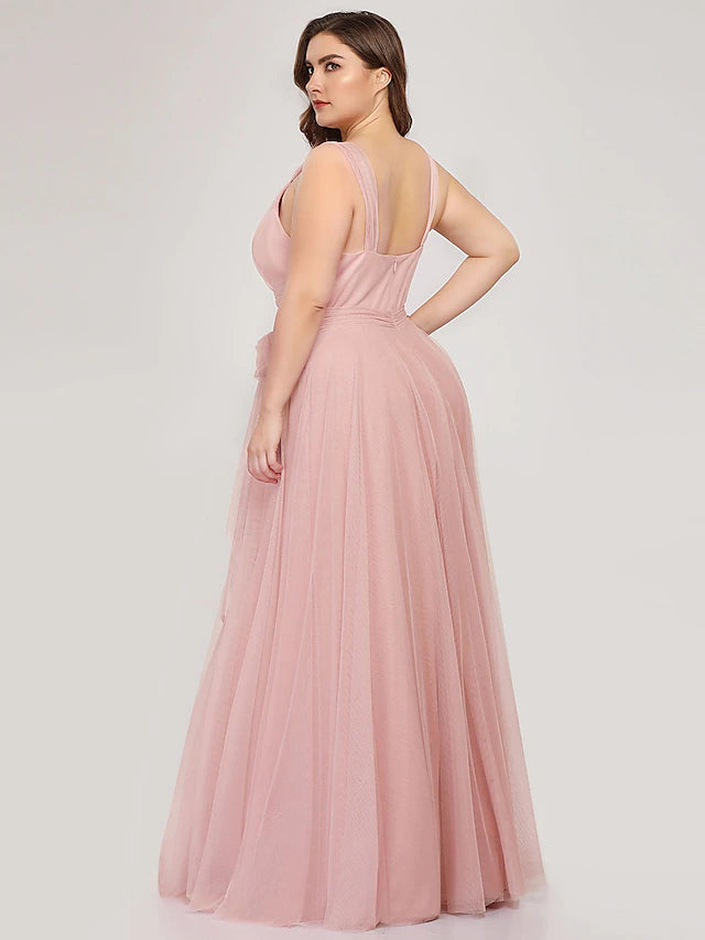 Full view of an elegant tulle bridesmaid dress.