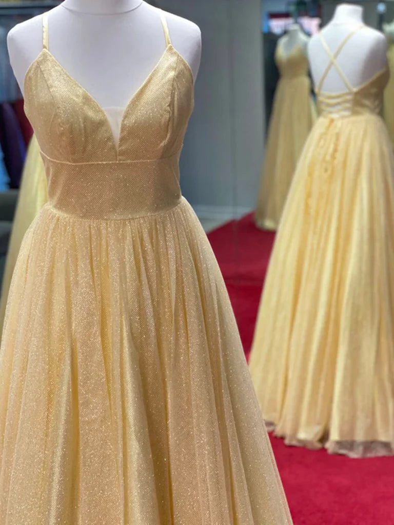Elegant A-line V-neck tulle sequin long prom dress on a model.