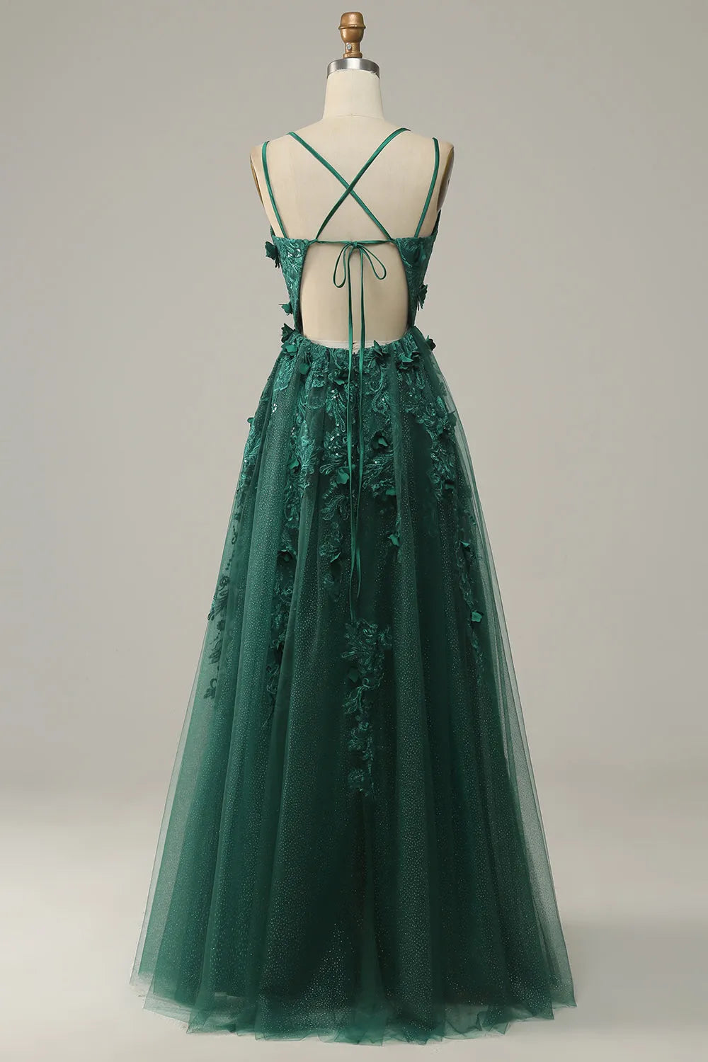 Back view of a flowing A-line prom dress.