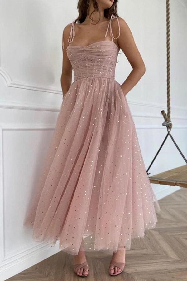 Pink A-line tea length prom dress with tulle straps and V-neck.