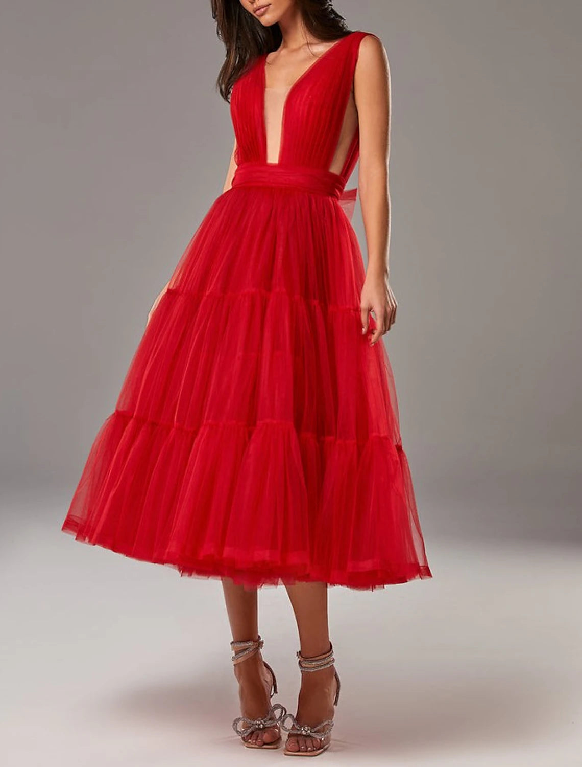 Model wearing the elegant A-line V-neck tea length dress.
