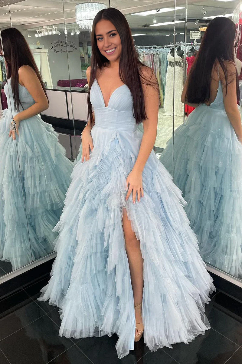 Side view of A-line tulle prom dress with V-neckline.