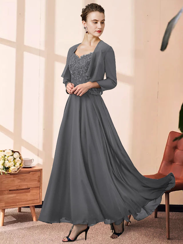 Elegant two-piece A-line Mother of the Bride dress with V-neck and lace appliques.