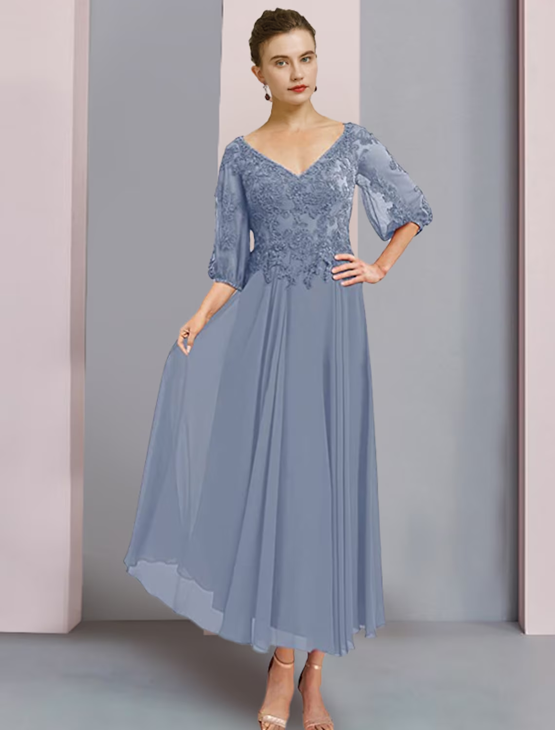 Elegant two-piece A-line mother of the bride dress with V-neck, 3/4 sleeves, and tea length.