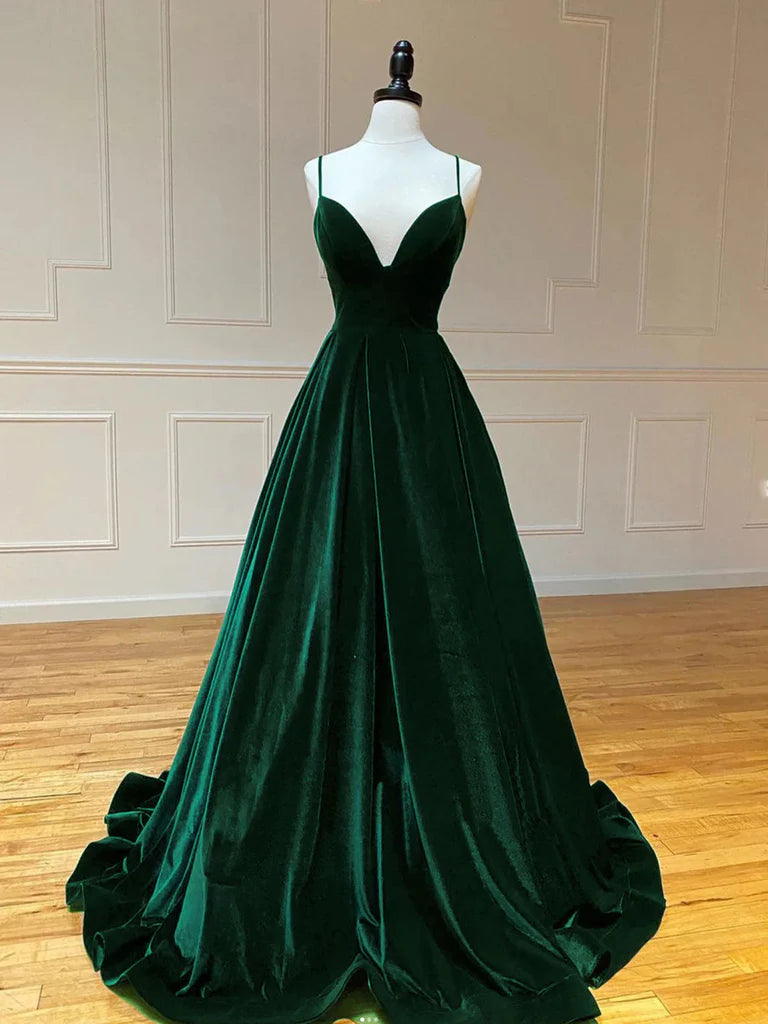 Model wearing an elegant dark velvet A-line V-neck long prom dress.