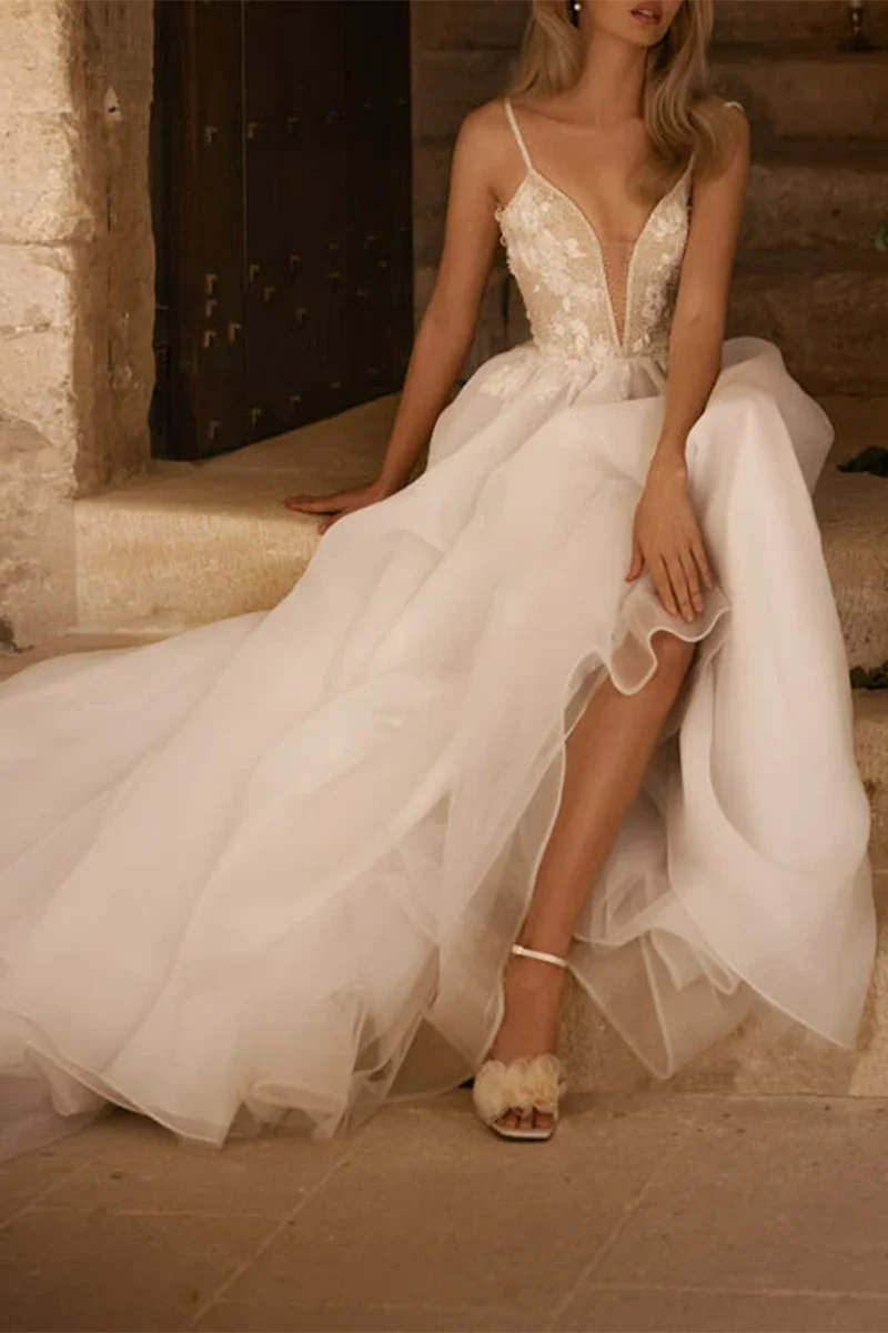 Back view of the A-line V-neck wedding dress, showcasing its flowing silhouette.
