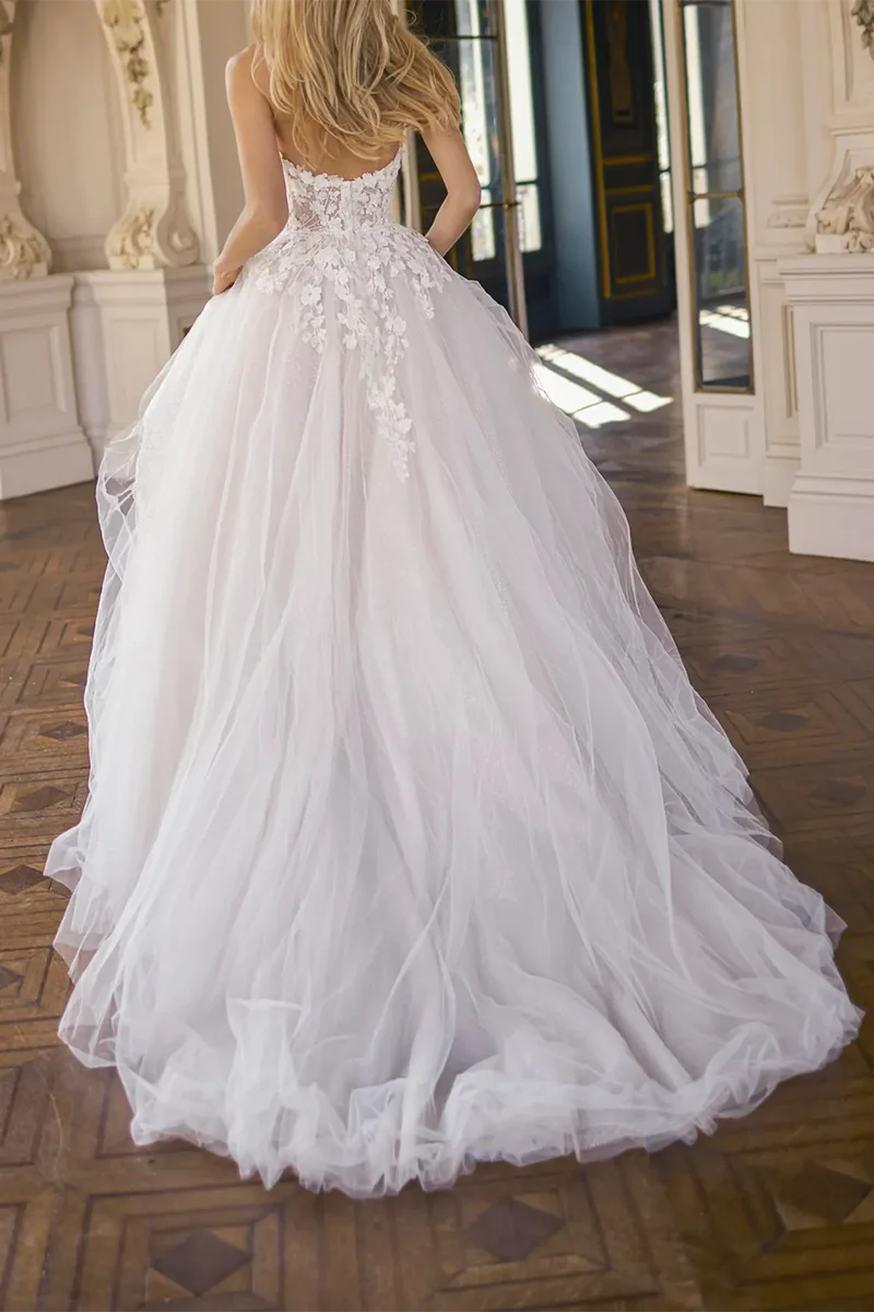 Back view of A-line wedding dress showing court train detail.