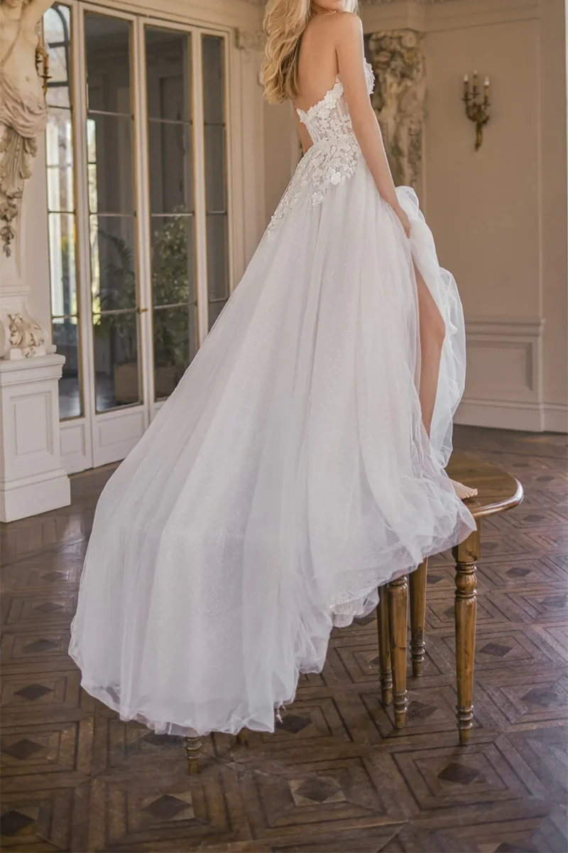 Detail of the V-neckline and bodice of the wedding dress.