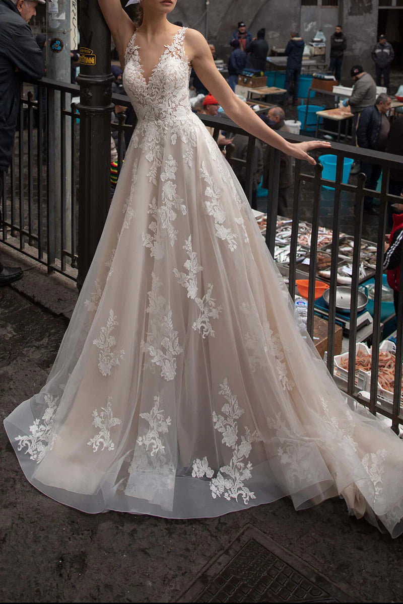 Elegant A-line V-neck wedding dress with lace appliques, full front view.