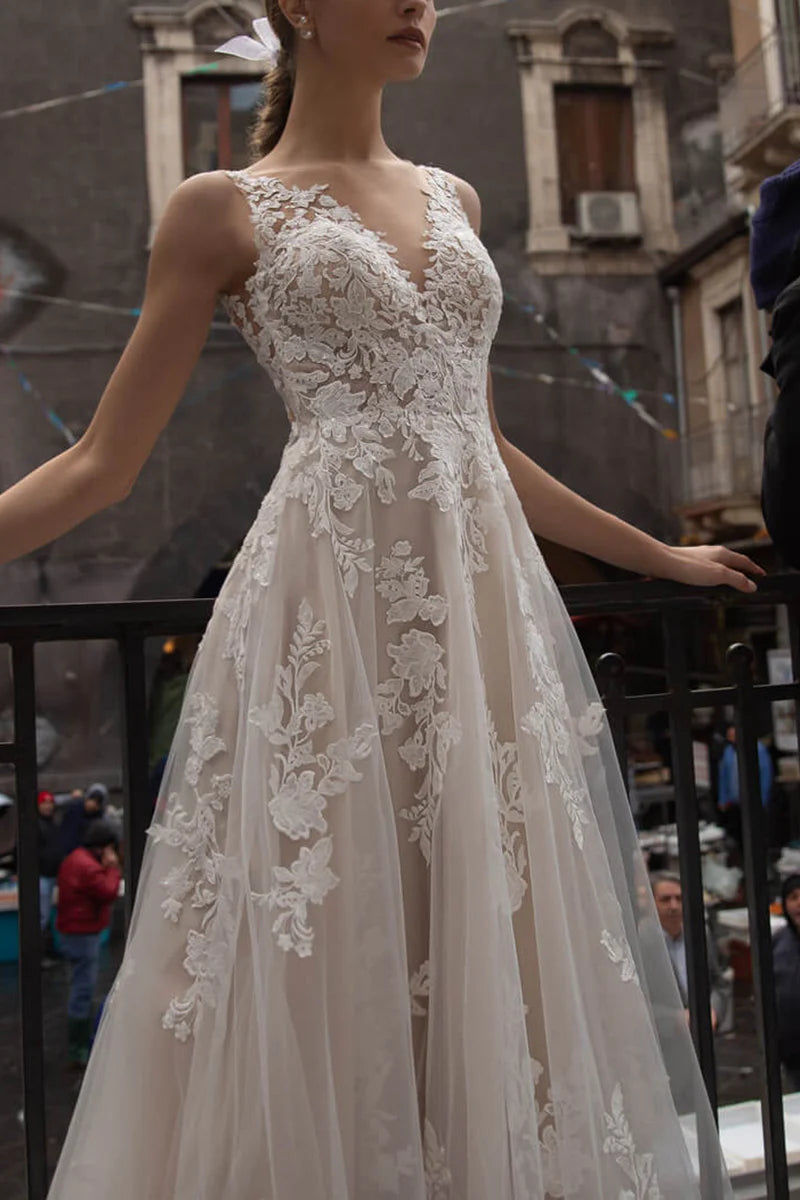 Side profile of the A-line wedding dress, showcasing its flowing silhouette.