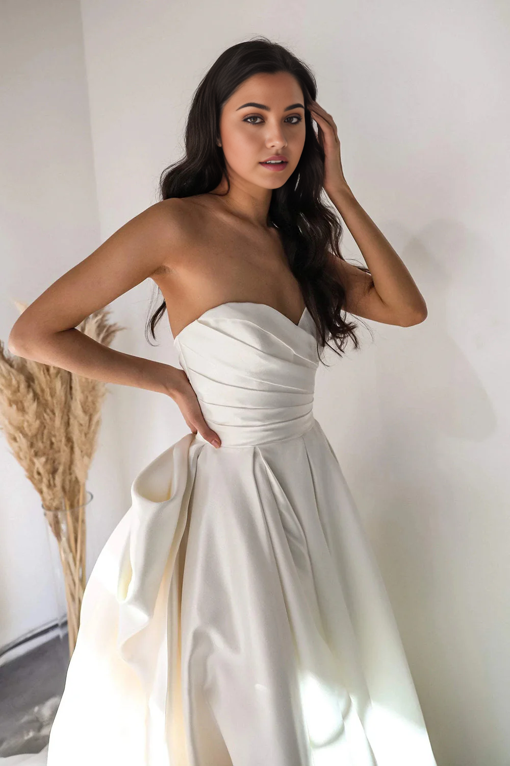 Side view of a bride wearing the A-line wedding dress, showing the flowing skirt.