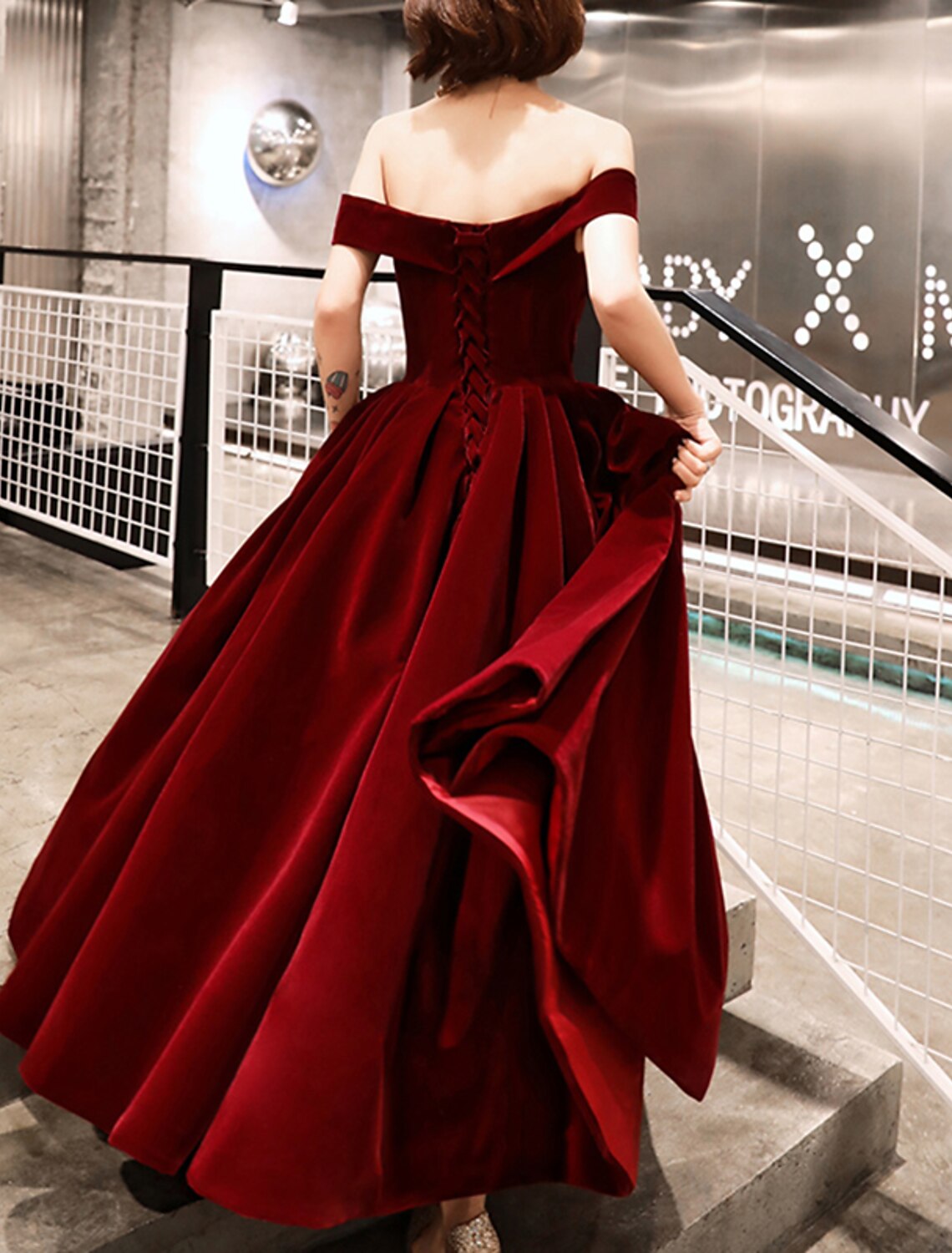 Elegant A-Line velvet off-shoulder evening gown.