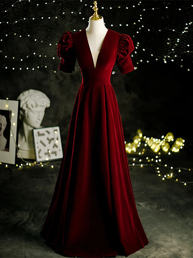 Elegant A-Line velvet Mother of the Bride dress with V-neck and short sleeves.
