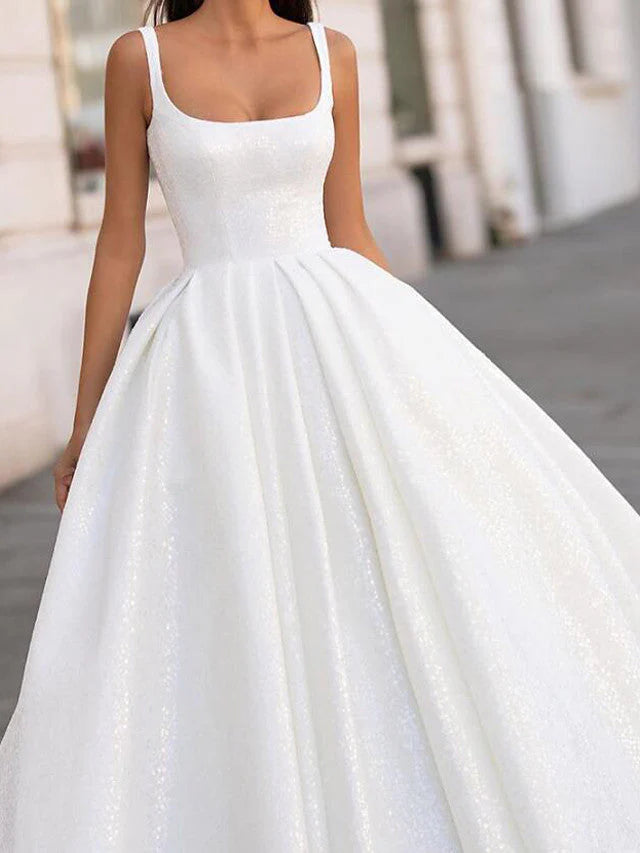 Back view of the A-line satin wedding dress showing the court train.