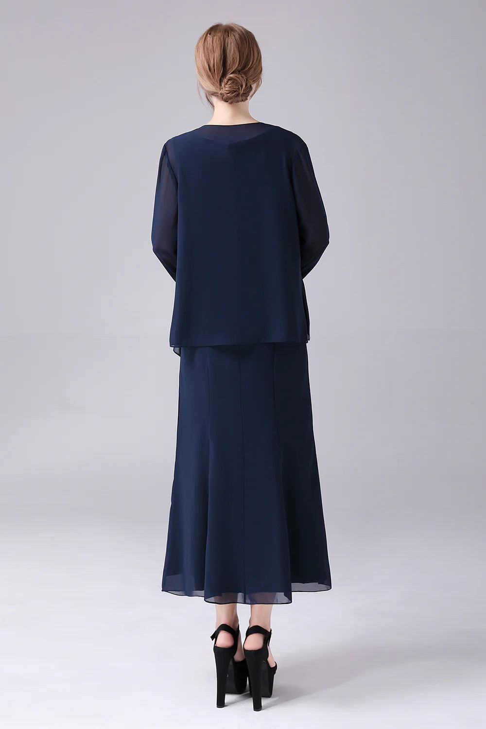 Back view of the two-piece A-line formal dress.