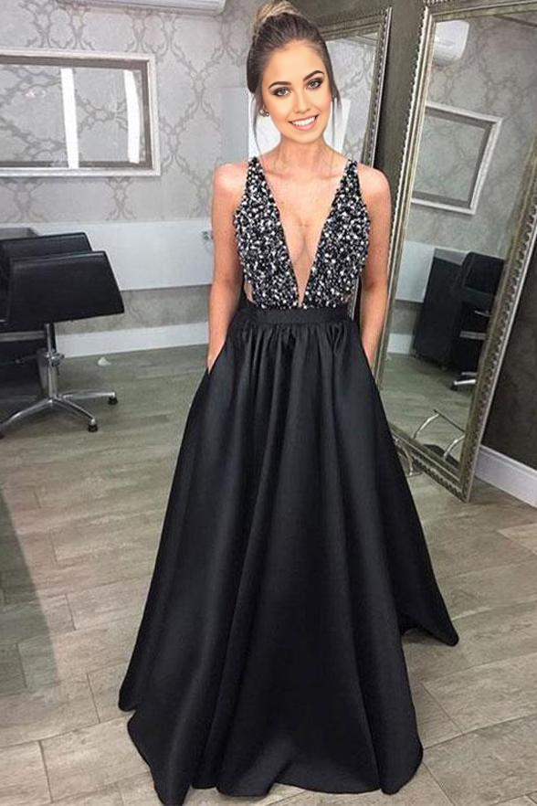 Elegant A-line black satin prom dress with a deep V-neckline and pockets.