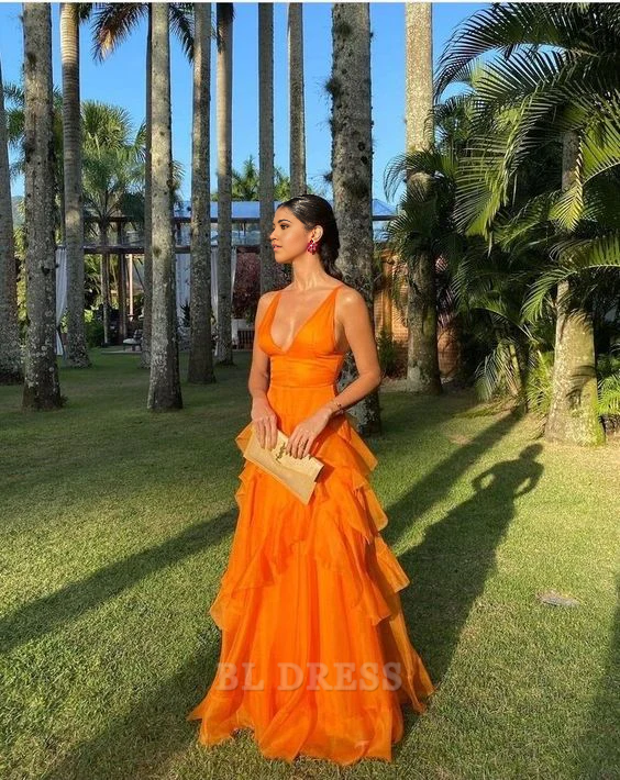 Orange A-line formal dress with deep V-neck and ruffles.