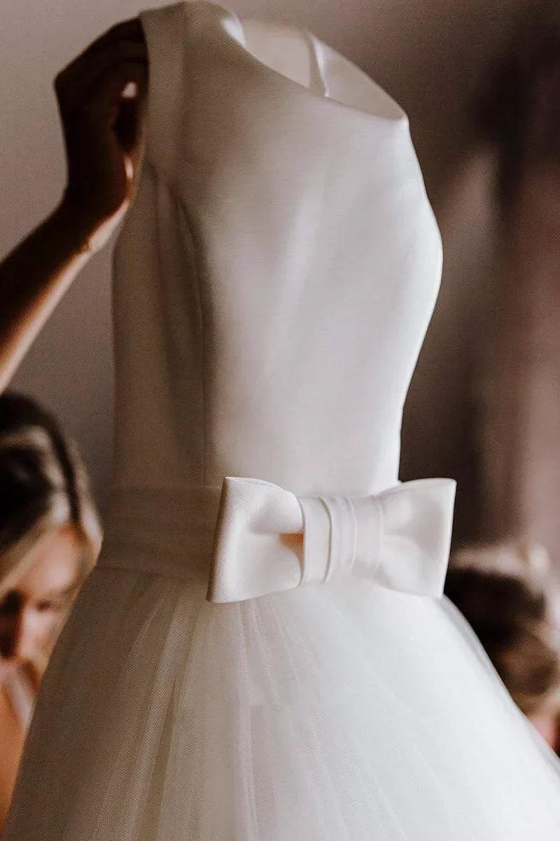Side view of the sleeveless A-line ballgown wedding dress.