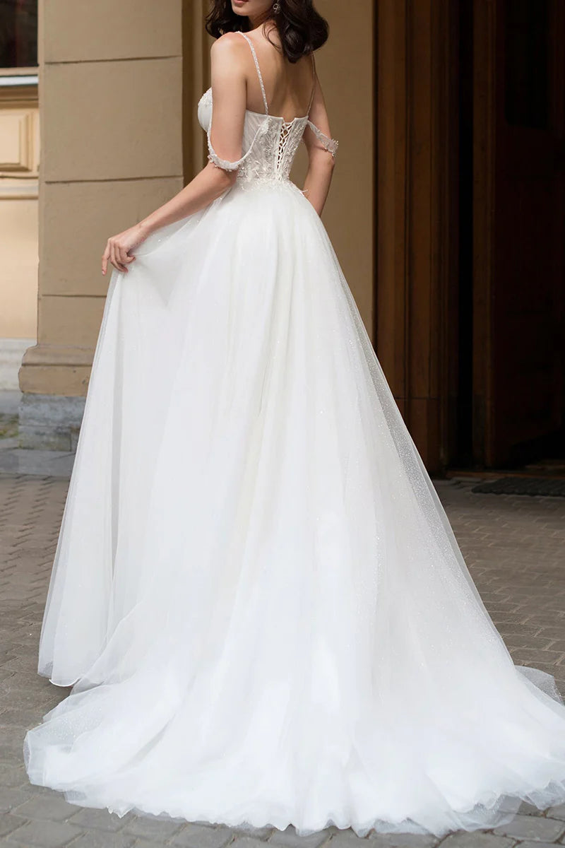 Full-length view of the A-line gown, highlighting the side slit and silhouette.
