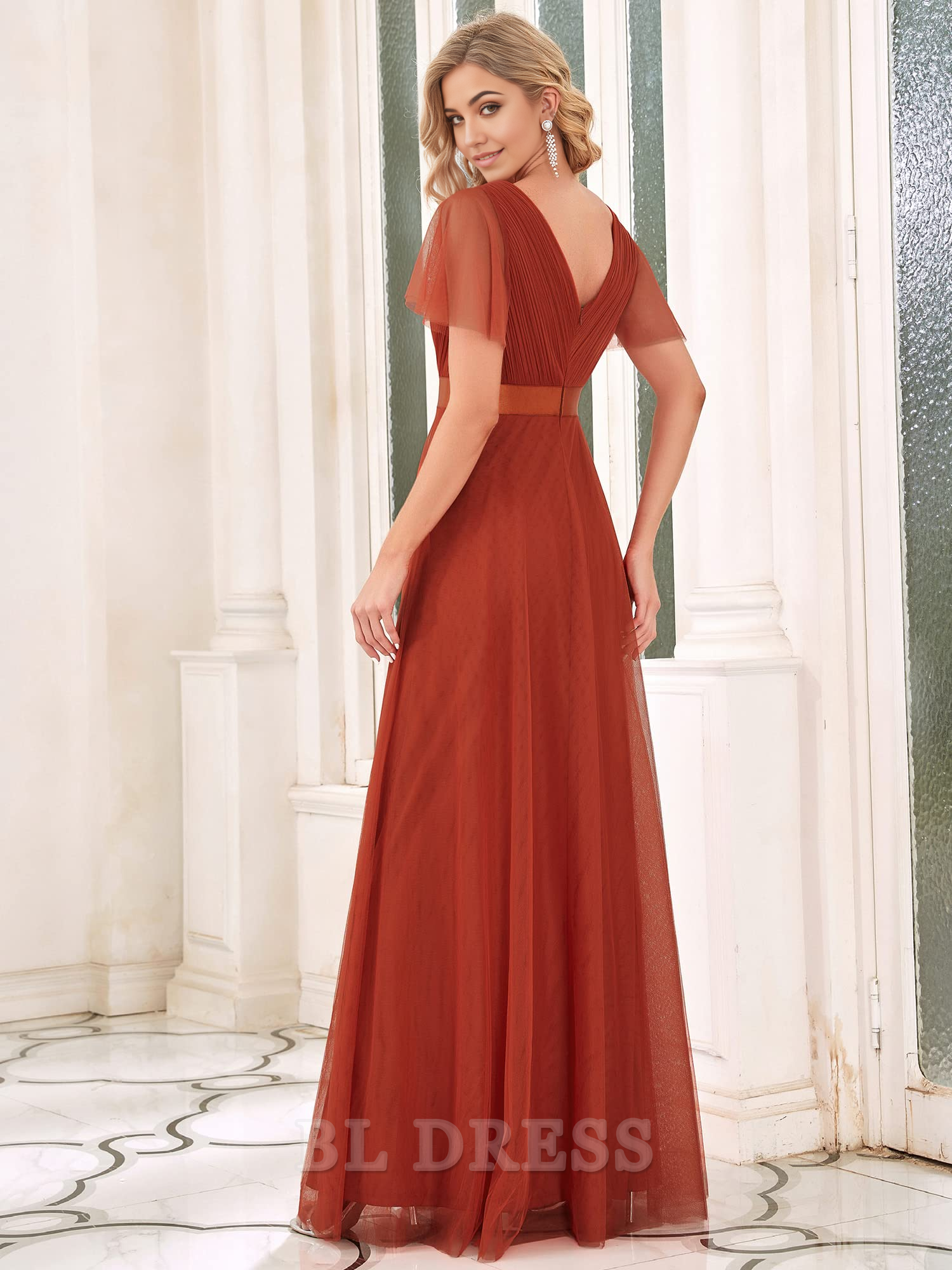 Back view of the A-line double V-neck tulle formal dress.