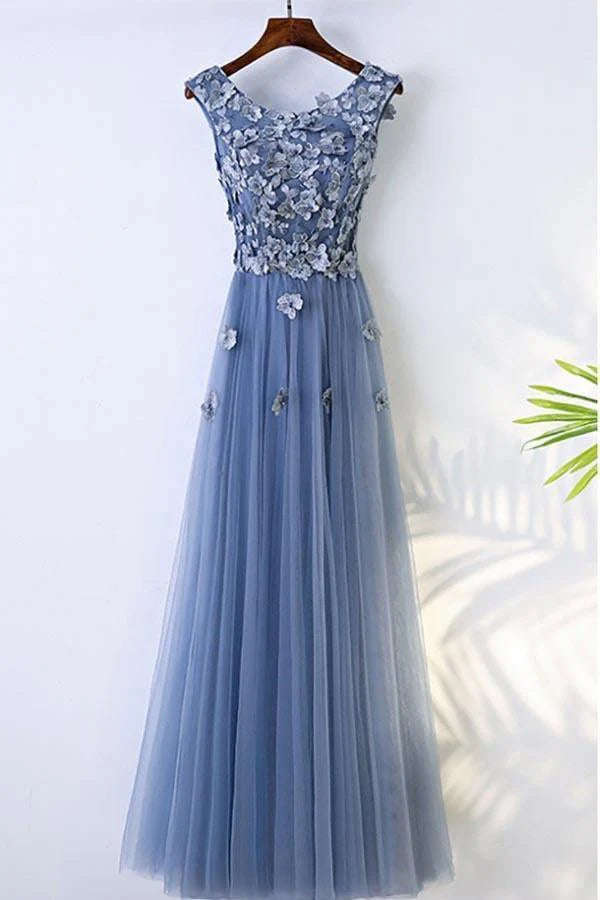 Elegant A-line floral prom maxi dress with delicate flower petals.