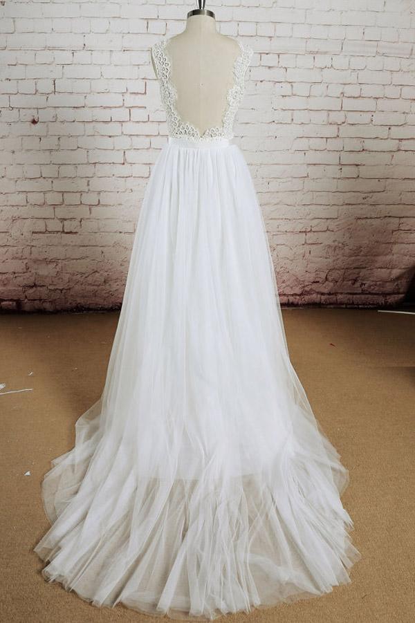 Close-up of the lace and tulle details on the A-line wedding dress.