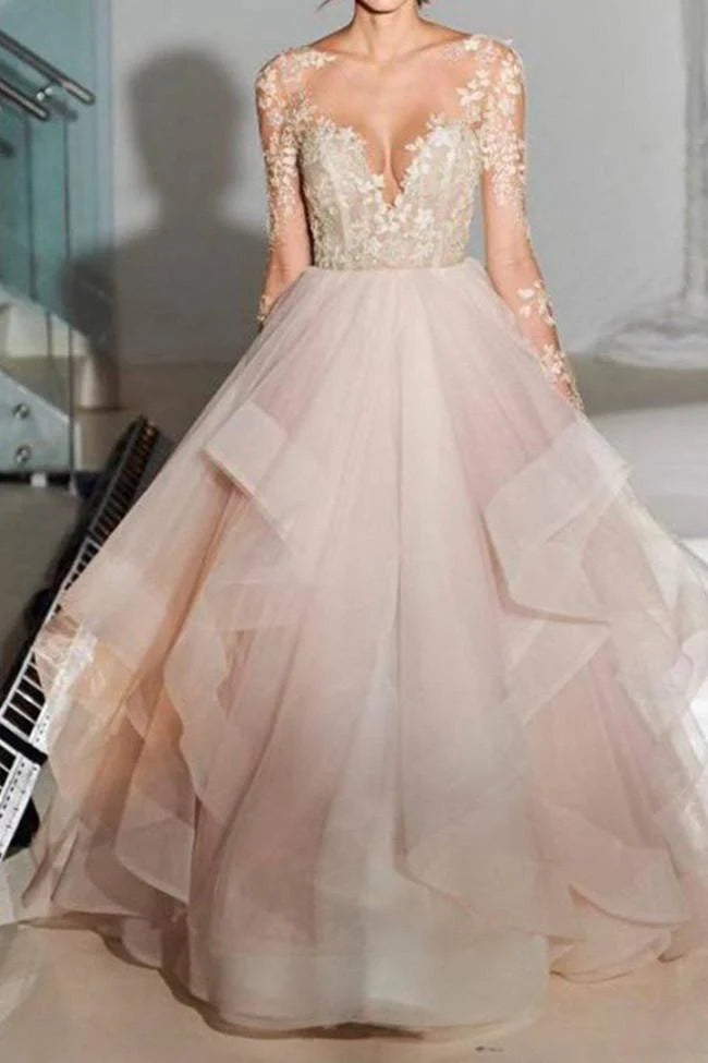 Elegant A-line lace long sleeve wedding gown with an open V-back.