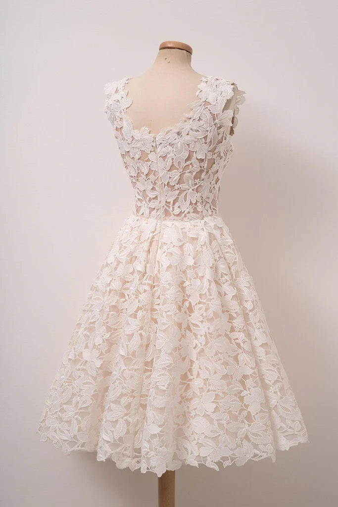 Model wearing an A-line ivory lace square neck short dress.